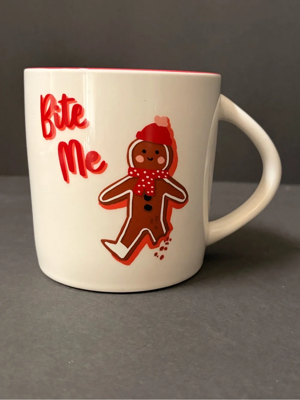 White Ceramic Mug with Red Interior and Gingerbread Graphic
